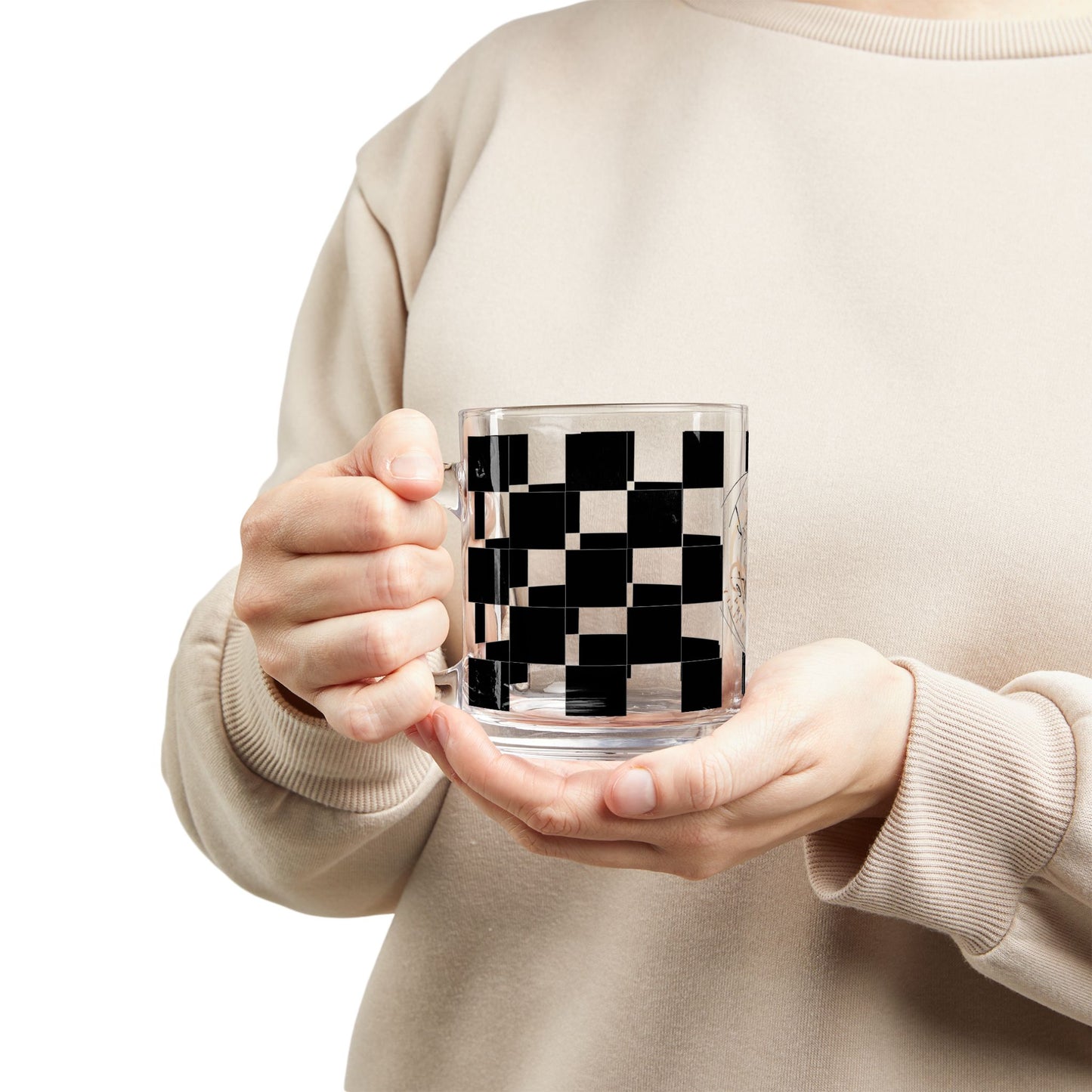 Chic Checkered Glass Mug - 10oz clear glass coffee cup with black and white checkered design held by person.