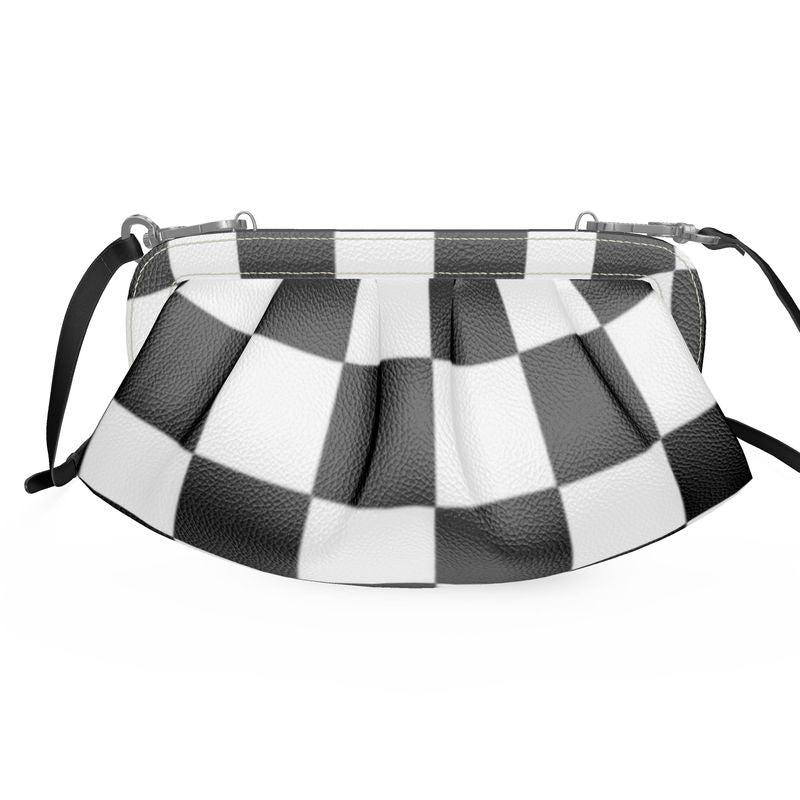 Designer pleated soft frame bag in black and white checkered pattern with detachable shoulder strap.