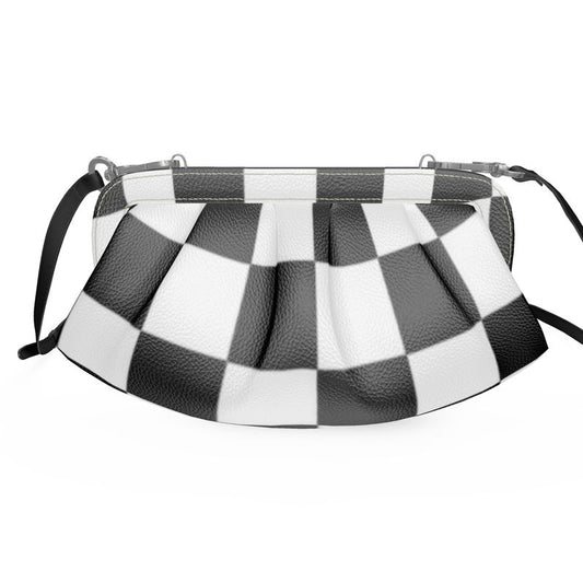 Designer pleated soft frame bag in black and white checkered pattern with detachable shoulder strap.