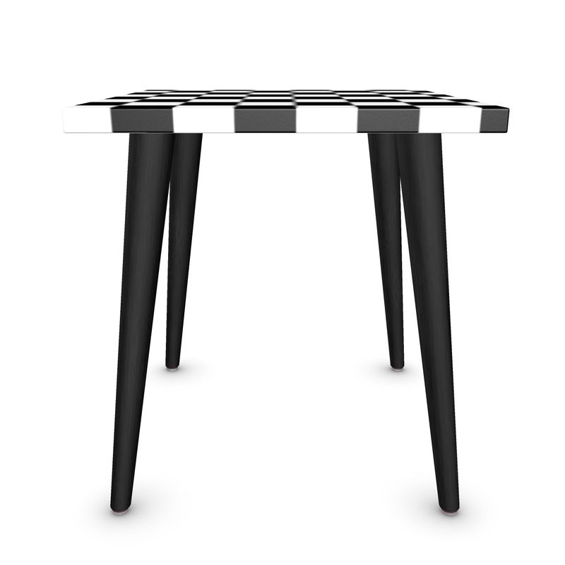Modern checkered side table with black legs, perfect for small spaces and stylish décor.